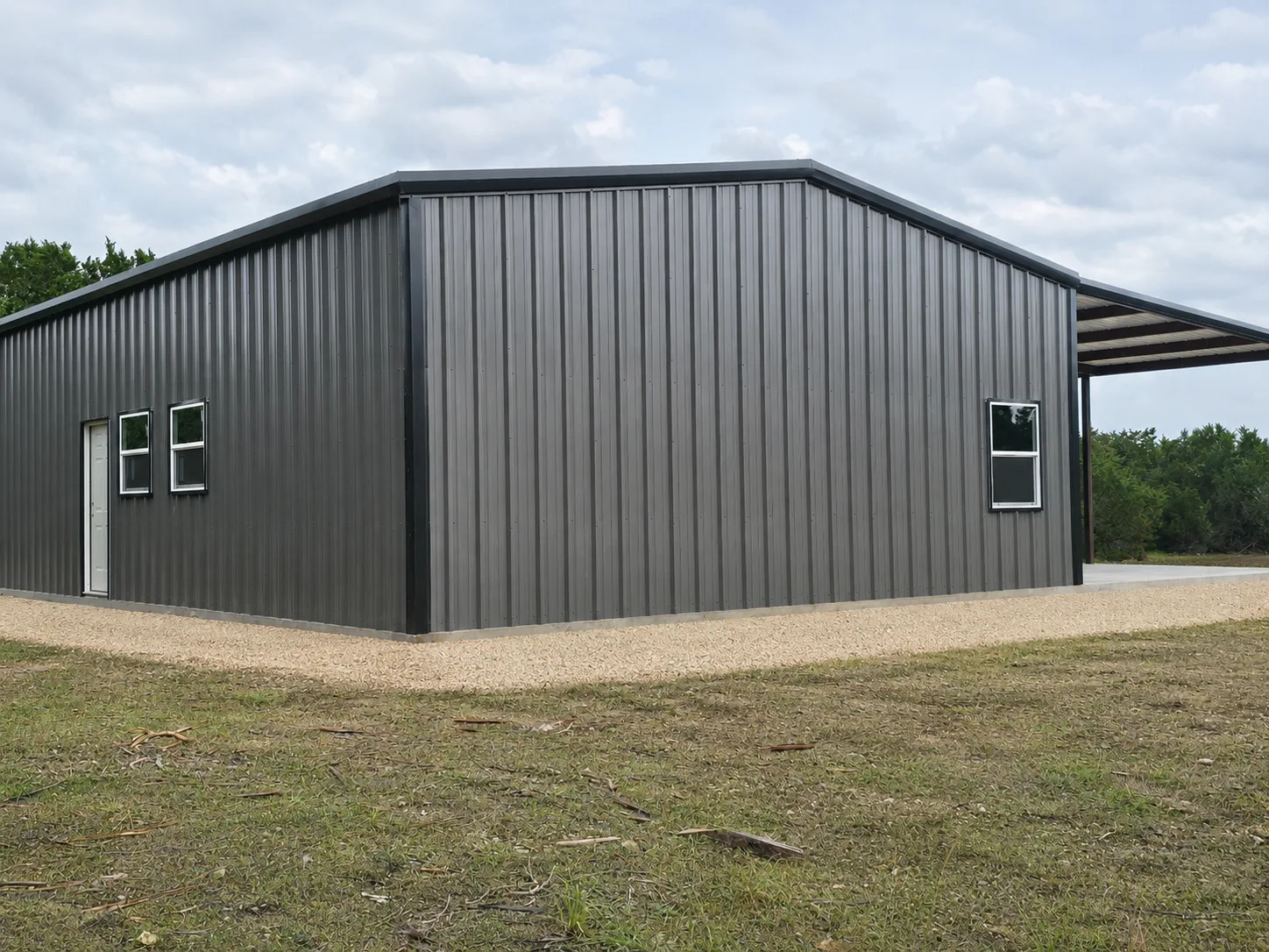 Finished steel barndo shell standing on Tract 5 at Legacy Oaks